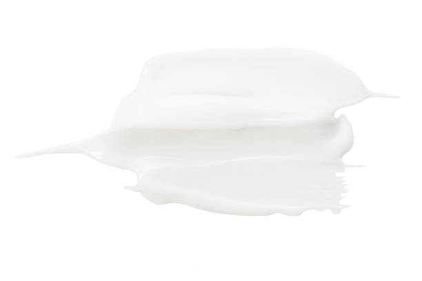 istock White Cosmetic Cream Isolated on White Background. Lipstick Smear. 1319929492