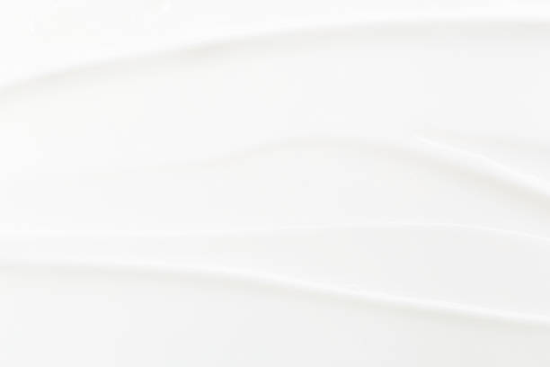 istock White Cosmetic Cream Isolated on White Background. Lipstick Smear. 1319929532