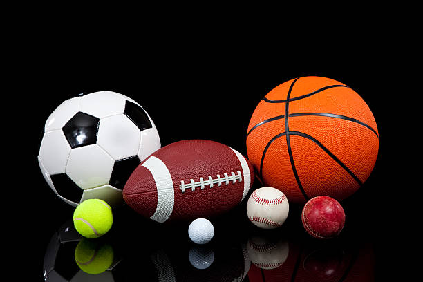 istock Assorted sports balls on a black background 131992957