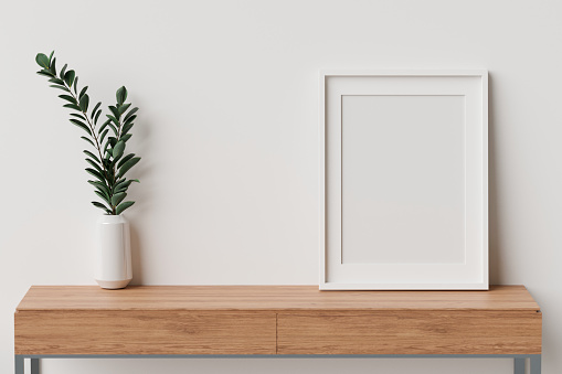 Minimal interior design with mock-up frame an plant vase on wooden table with white wall, 3D rendering, 3D illustration