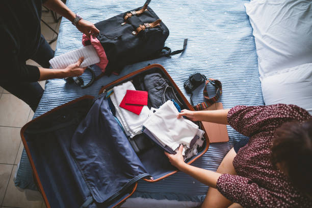 istock Couple preparing for travel 1319930503