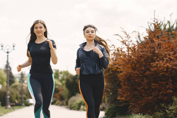 istock Sports girls training in a summer forest 1319932722