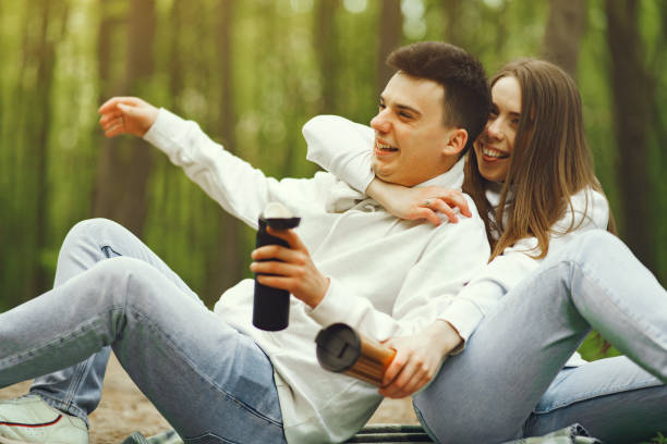 istock Beautiful couple spend time in a spring forest 1319932967