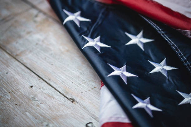 istock USA Flag on wooden background 1319937175