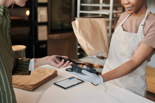 istock Customer paying online in the shop 1319937268