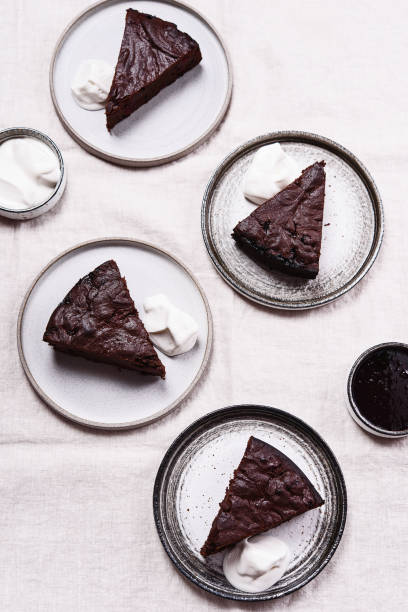 istock Slices of rich moist chocolate cherry cake 1319938236
