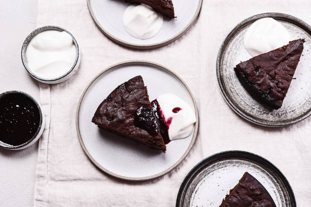 istock Slices of rich moist chocolate cherry cake 1319938249