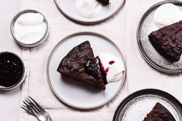 istock Slices of rich moist chocolate cherry cake 1319938250