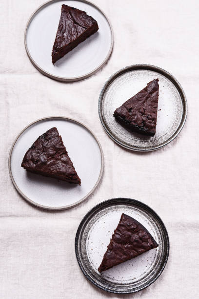 istock Slices of rich moist chocolate cherry cake 1319938251