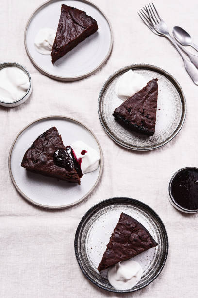 istock Slices of rich moist chocolate cherry cake 1319938261