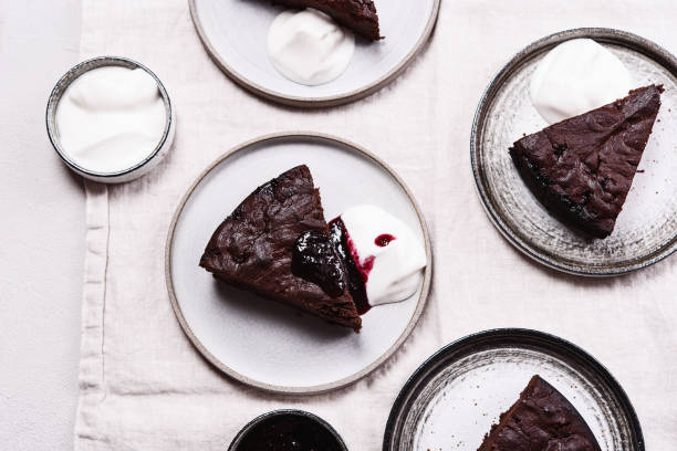 istock Slices of rich moist chocolate cherry cake 1319938267