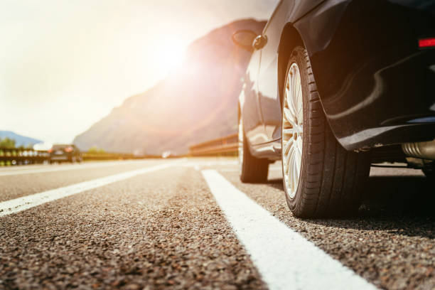 car is standing on the breakdown lane, asphalt and tyre, italy - road landscape journey road trip imagens e fotografias de stock