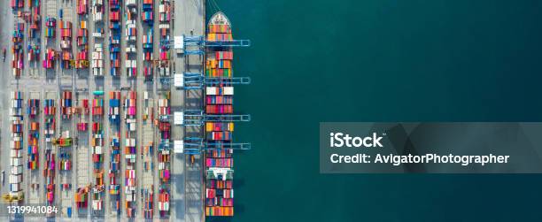 Aerial View Container Ship In Port At Container Terminal Port Ship Of Container Ship Stand In Terminal Port On Loading Unloading Container Commercial Cargo Ship In Sea Port Stock Photo - Download Image Now