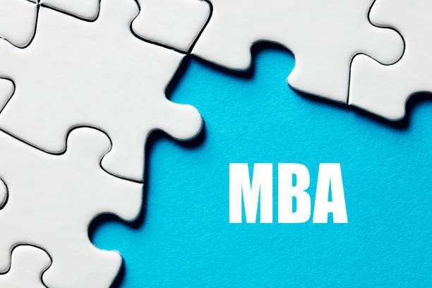 istock MBA master of business administration word surrounded by puzzle pieces. Higher education 1319941501