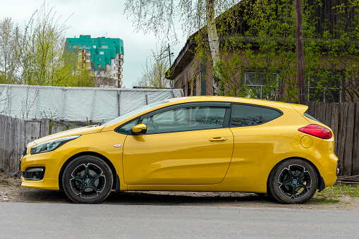 Day in city, horizontal shot side view. Surgut, Russia - 17, May 2021.