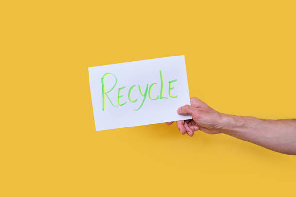 istock message on a white poster board with the word recycle on an isolated background 1319942559