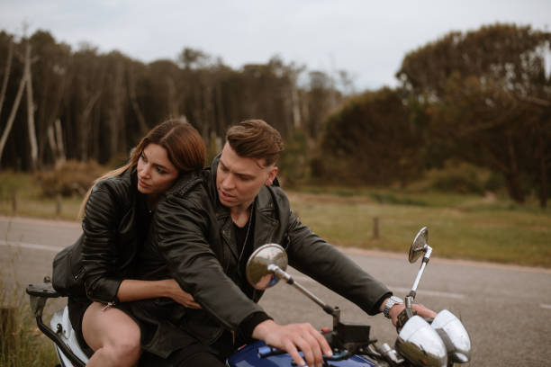 istock Young couple on a motorcycle 1319944798