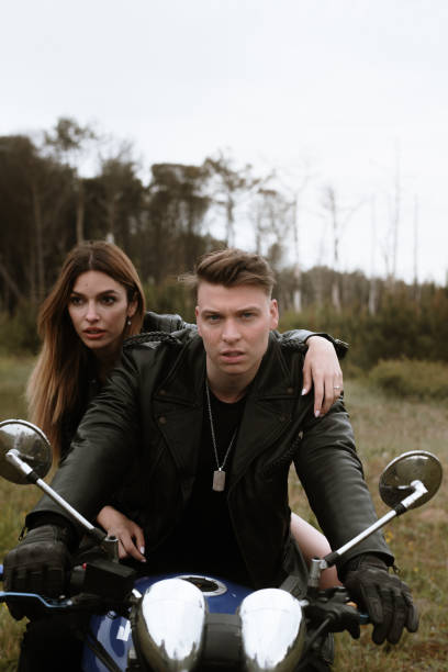 istock Young couple on a motorcycle 1319944813