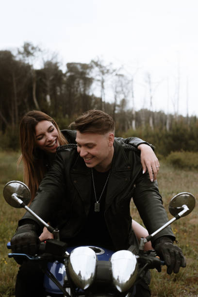 istock Young couple on a motorcycle 1319944823
