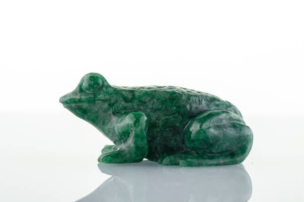 istock beautiful figurine of a toad made of malachite on a white background 1319947530