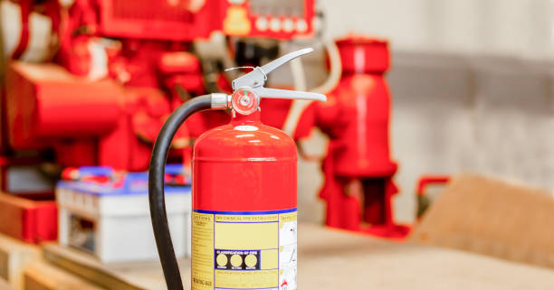 istock The red fire extinguisher is ready for use in case of an indoor fire emergency. 1319947982