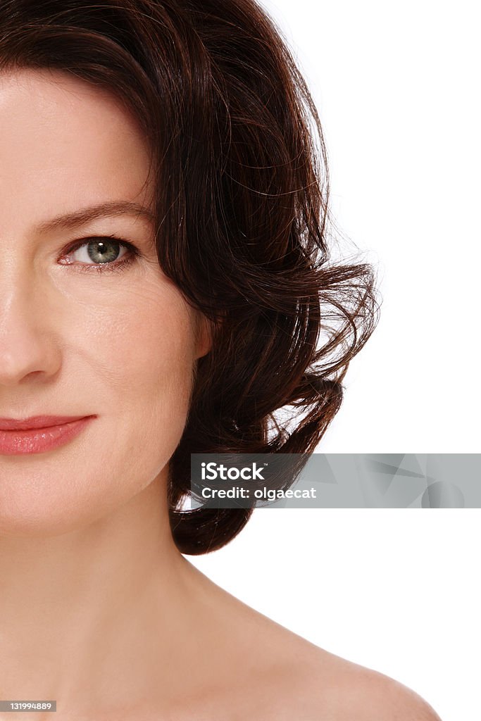 Mature beauty Close-up shot of attractive groomed healthy middle-aged woman on white background 40-49 Years Stock Photo