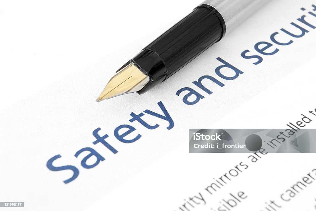 Safety & security Audit checklist Close-up of safety and security audit checklist with pen on it Questionnaire Stock Photo