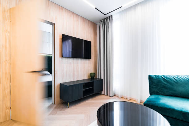 istock Opening door from one room to another 1319951590