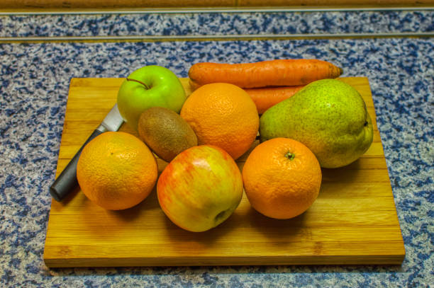 istock Fresh fruits and vegetables ready for slicing. 1319954029
