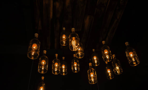 istock Vintage yellow hanging interior lamps 1319954244
