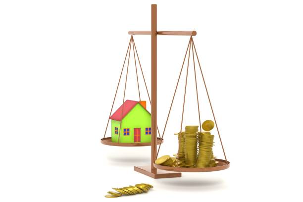 istock 3d illustration. Scales with coins and house 1319956021