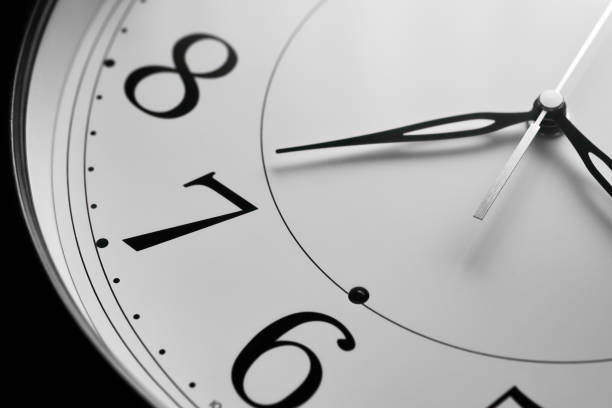 istock Close up of a clock isolated 1319956447
