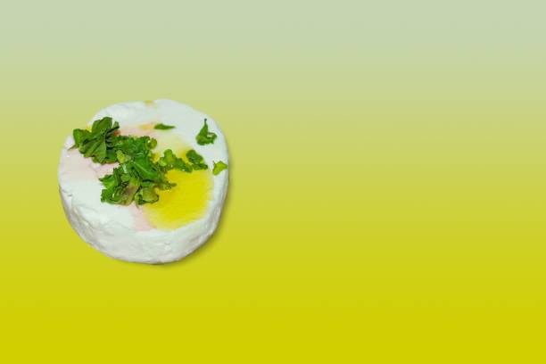 istock tomino cheese with olive oil and parsley 1319956639