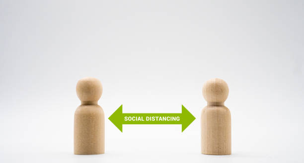 istock Distance between wooden human icon. 1319957522