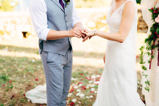 istock Midsection Of Couple Holding Hands 1319957818