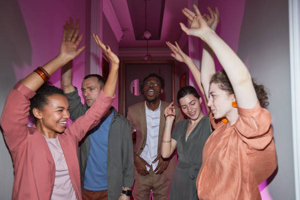 istock People Dancing at House Party 1319959418