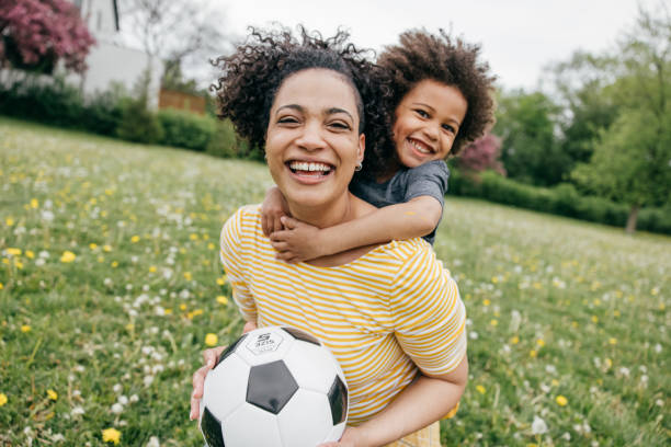 istock Summertime happiness-mother and son posing for camera 1319959592
