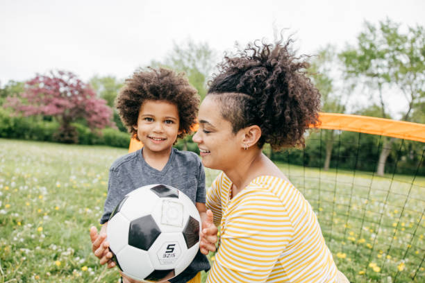 istock Toddler Posing with soccer ball 1319959608