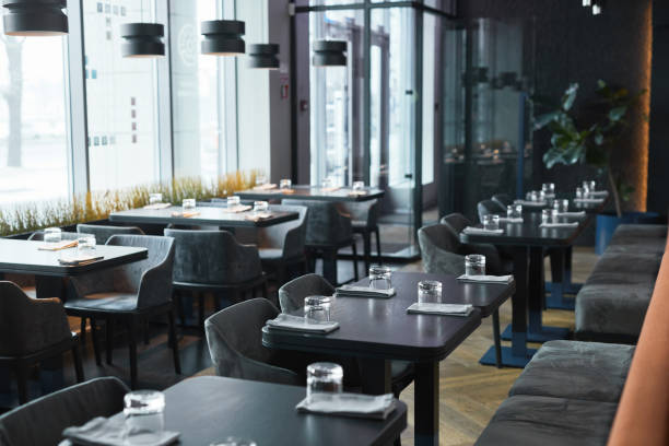 istock Modern interior of restaurant in gray color 1319959942