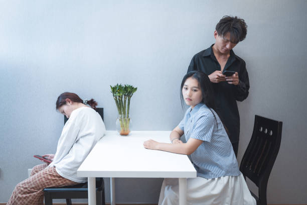 istock In a clean and tidy environment, three young people are using mobile electronic devices to communicate 1319960078