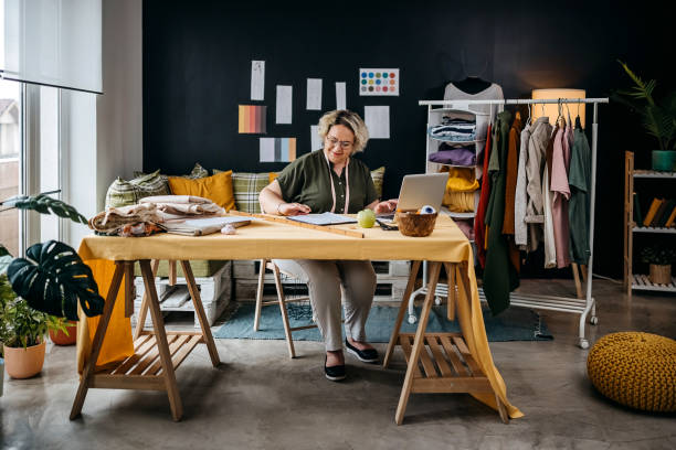istock Female fashion designer working 1319961543