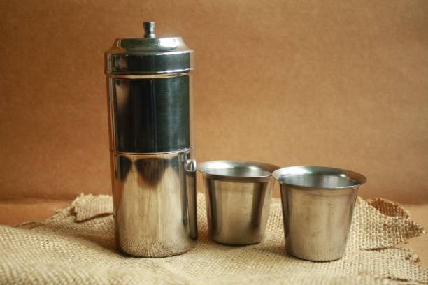 istock South Indian Traditional Filter coffee. Concept coffee time Coffee filter and cup(Tumbler) 1319965095