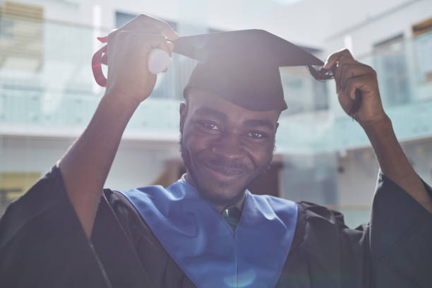 istock Happy African man in graduation cap 1319965489