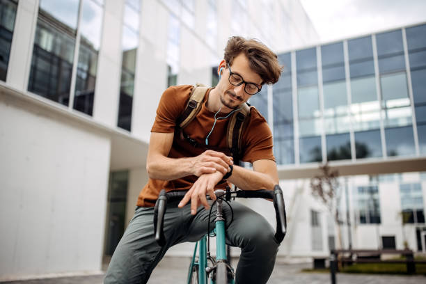 istock Businessman going to office on bicycle 1319969019