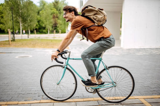 istock Man travels through the city on his bicycle 1319969774