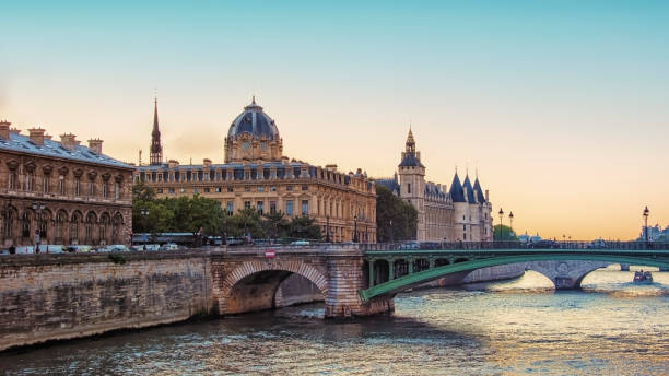 istock Conciergerie and Seine river in Paris at sunset 1319970773