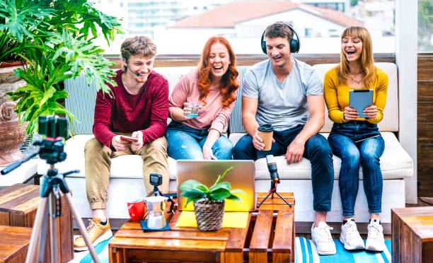 istock Young people startupper having fun on streaming platform with web cam - Start up marketing concept with millennial guys and girls sharing live vlog feed on social media network 1319973181