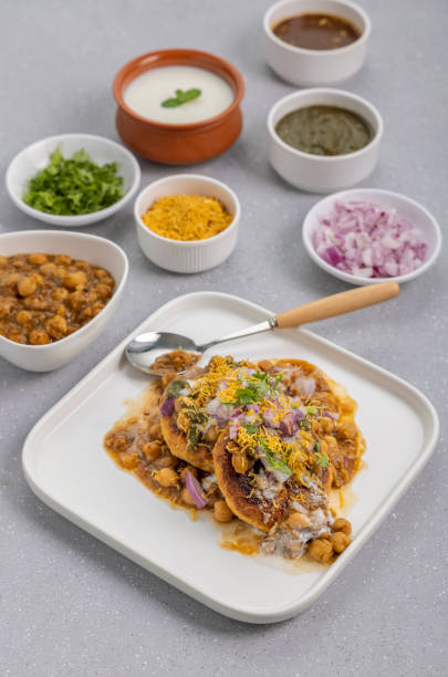 istock Aloo Tikki or Cutlet or Aloo Patties  dipped in Chickpea curry 1319973189