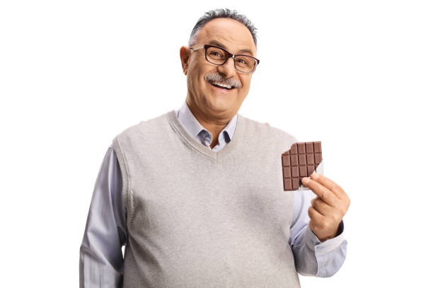 istock Happy mature man holding a chocolate 1319973525