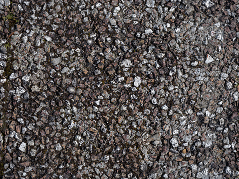 Gravel on an aged pavement